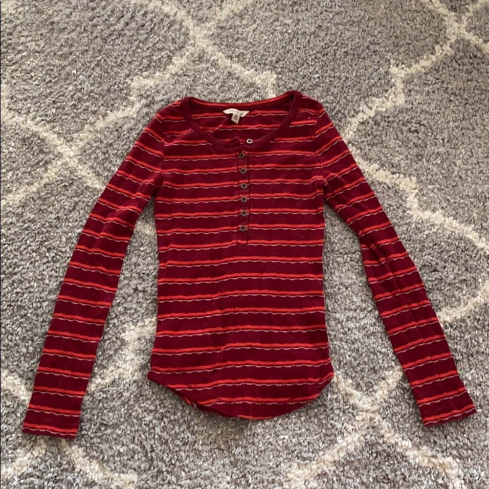 Red striped long sleeve.